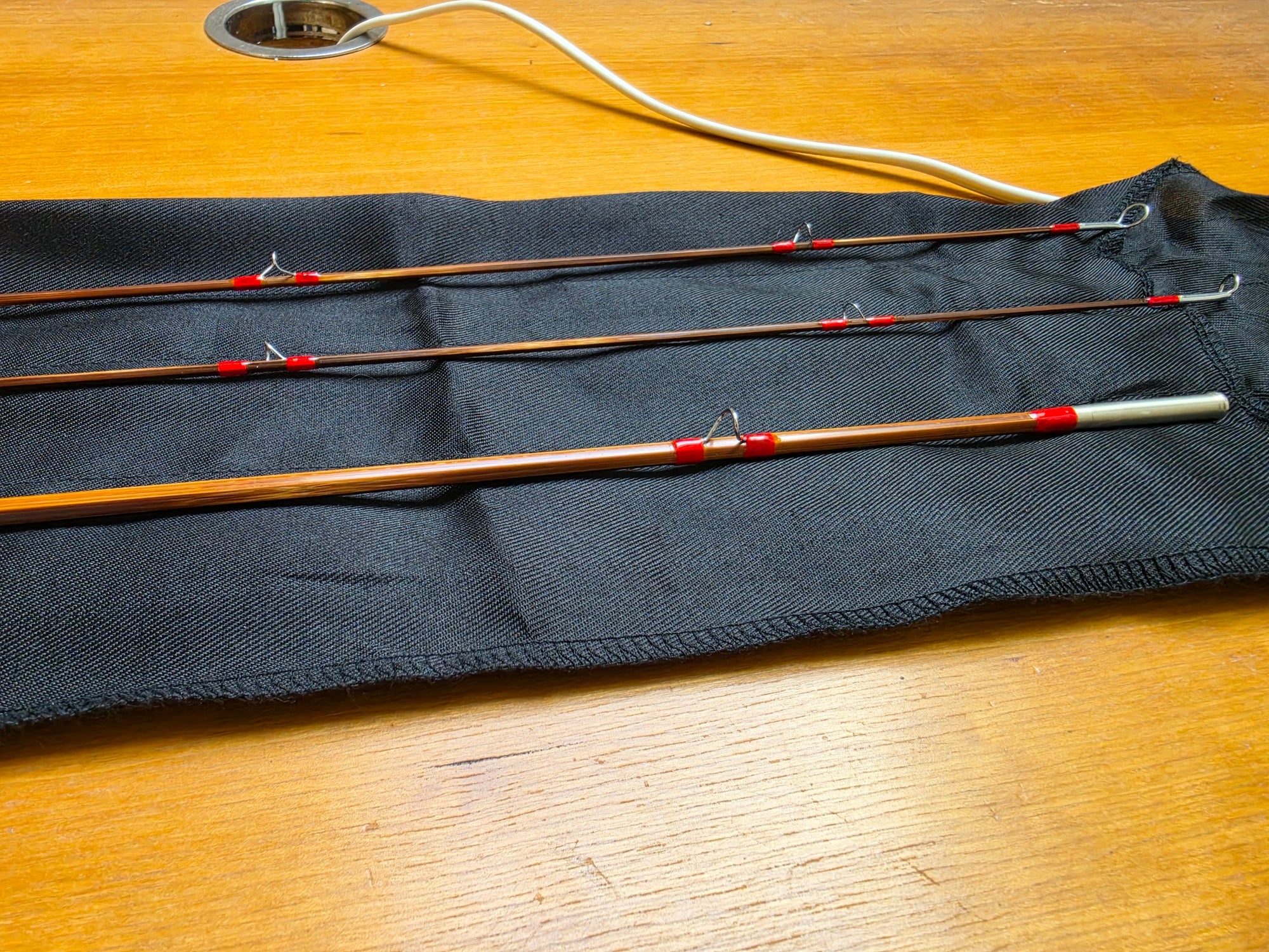 Amber agate stripping guide on Anglers Roost Dickerson 7012 bamboo fly rod