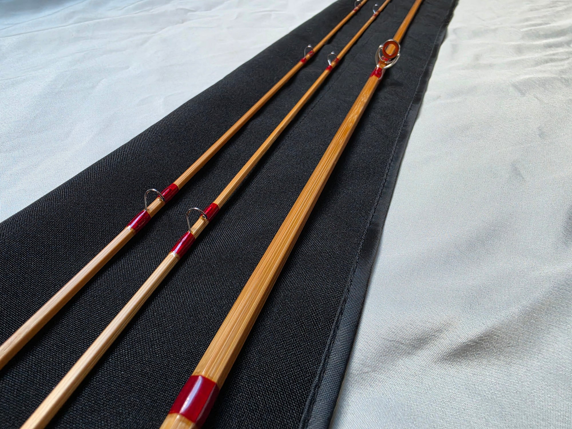Snake guides and scarlet red silk wraps on Dickerson 7613 split-cane fly rod