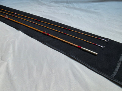 Finished Dickerson 7613 split-cane fly rod, 7'6" 5wt two-tip, laid out with cloth rod bag