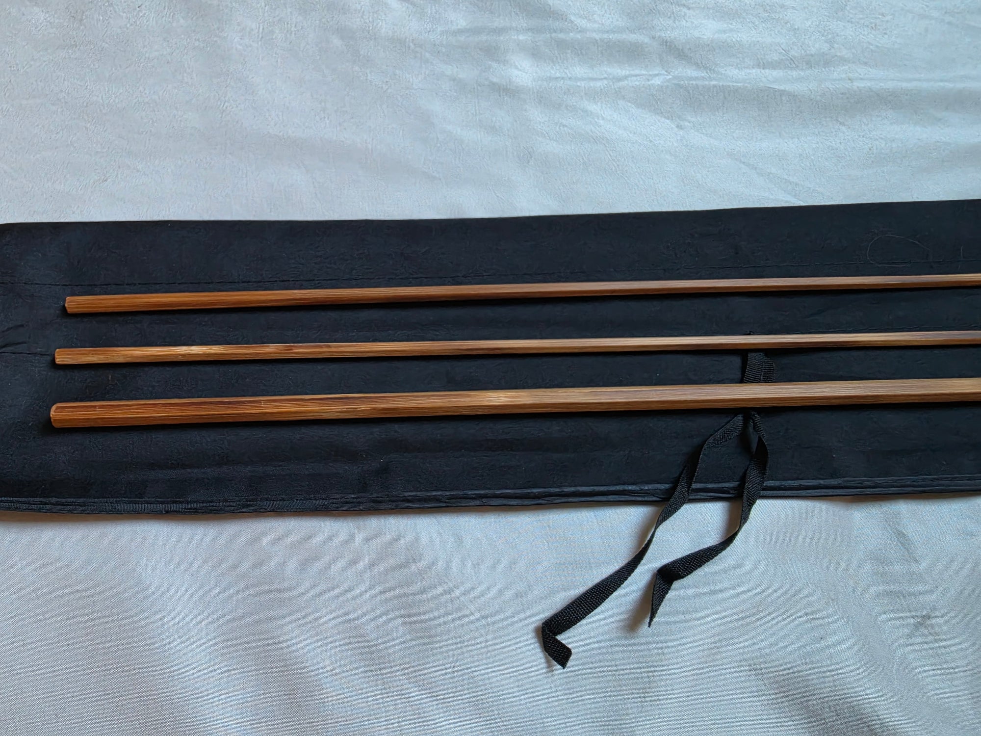 Powell taper bamboo fly rod blank with cloth storage bag and tie