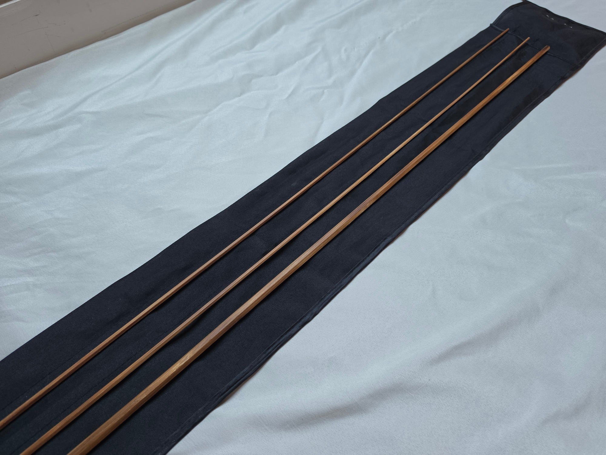 Powell taper 7'6" bamboo rod blank, two-piece two-tip, full layout straight-on view
