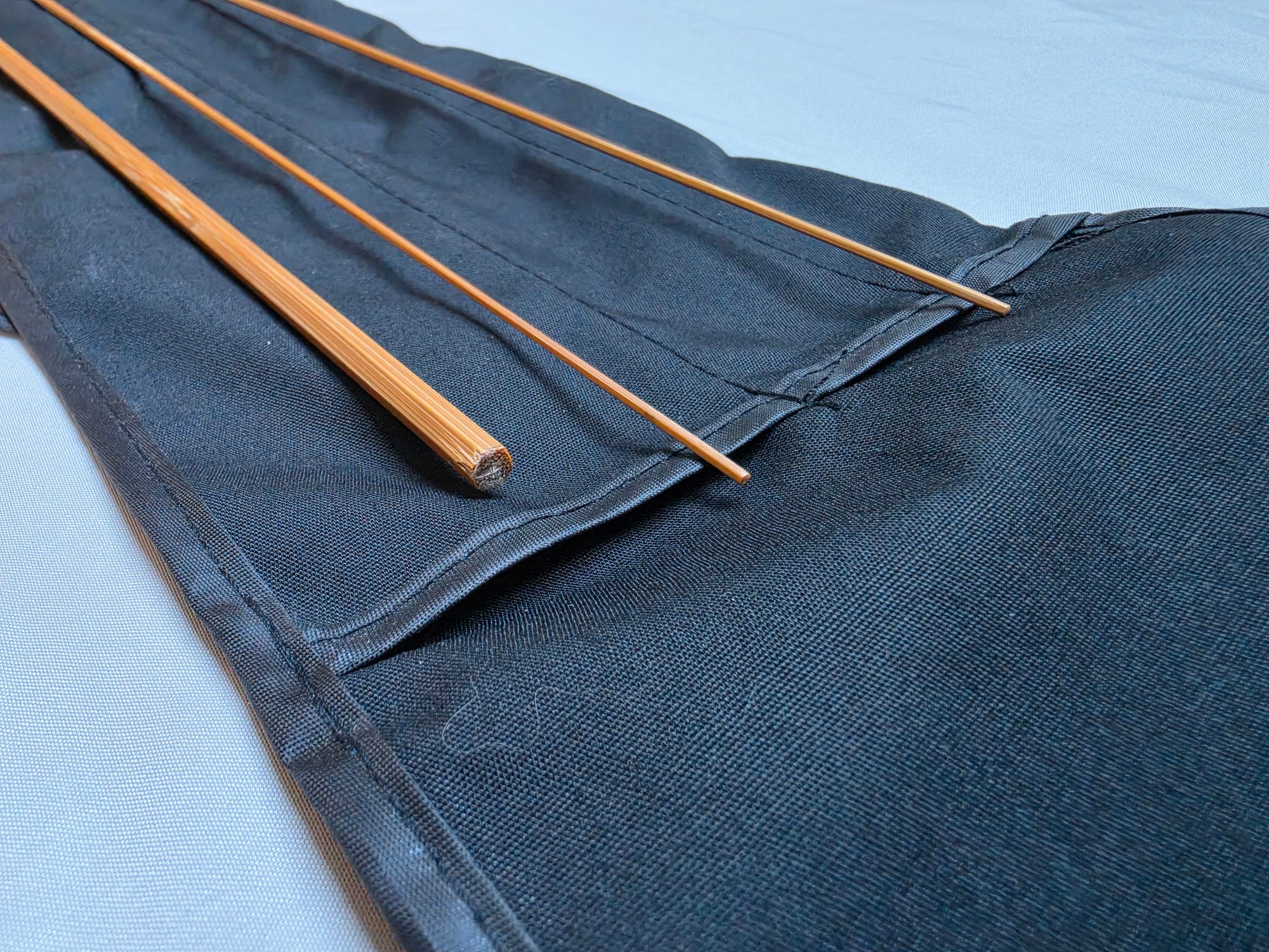 Close-up of bare-cane bamboo rod blank tip sections, no ferrules installed