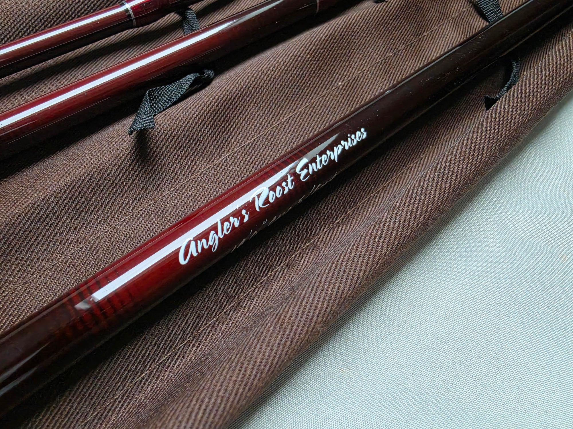 Angler's Roost Enterprises signature on oxblood IM6 graphite Spey rod blank