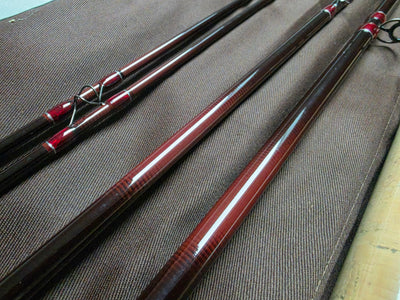 Red wraps and snake guides on oxblood IM6 graphite Spey rod